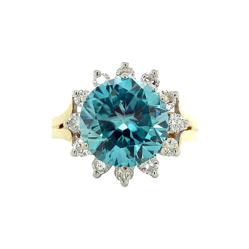 Gouden entourage ring met diamant en blauwe zirkoon 14 krt