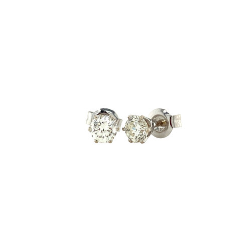 Witgouden solitair oorstekers met diamant 0.76ct. 18 krt