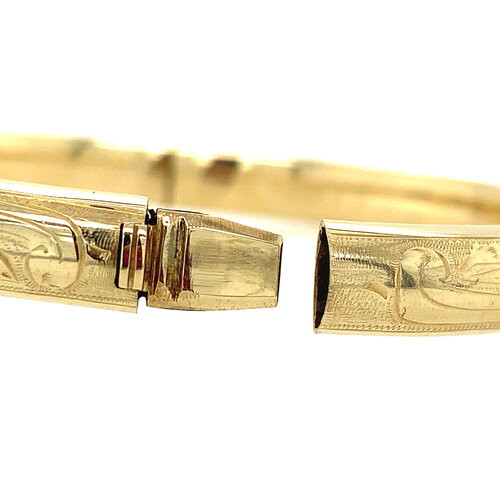 Gold bangle with engraving 14 crt