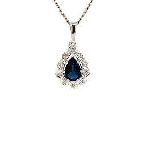 White gold pendant with diamond and sapphire 18 crt