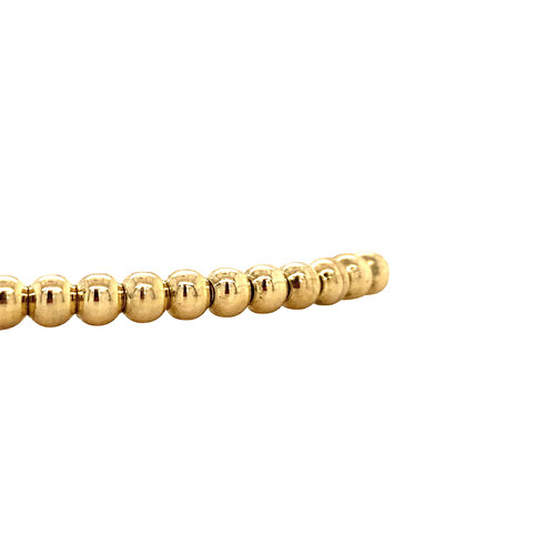 Gold stretch bracelet Essentials 18 crt