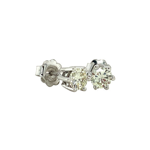 White gold solitaire stud earrings with 14 kt diamond