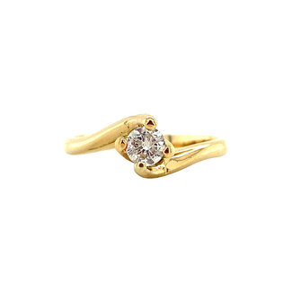 Gold solitaire ring with 18 kt diamond