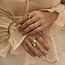 White gold ring with green color stone and diamond 18 crt