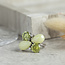 White gold ring with green color stone and diamond 18 crt