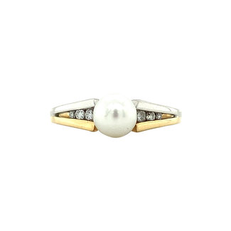 Gouden ring met parel en diamant 14 krt