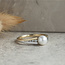 Gouden ring met parel en diamant 14 krt
