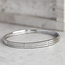 Witgouden bangle met diamant 14 karaat