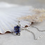 WItgouden hanger met diamant en blauw glas 18 krt