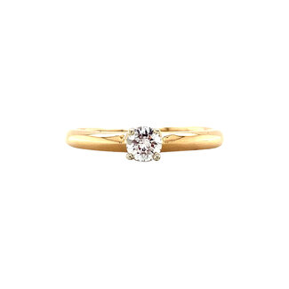 Gold solitaire ring with 18 kt diamond