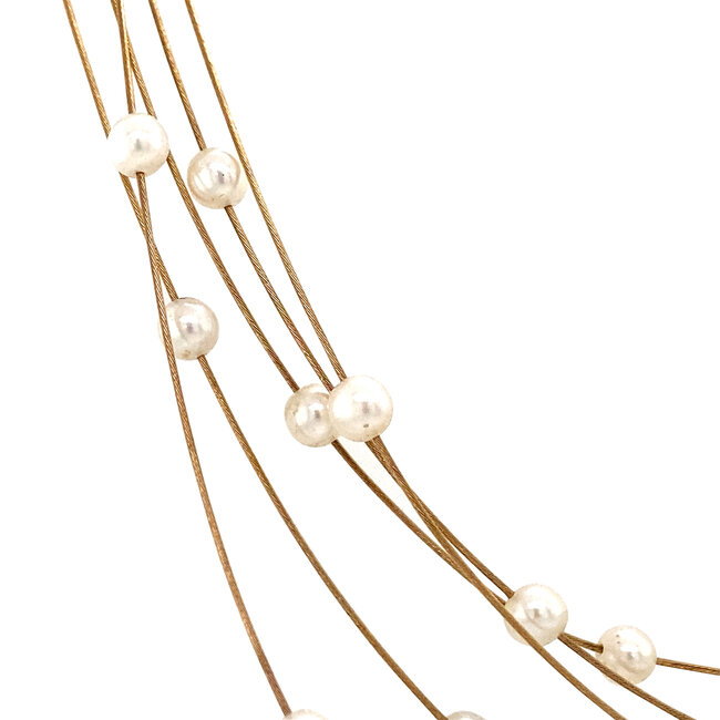 Gouden spang met parels 14 karaat