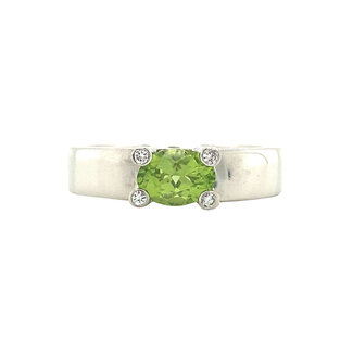 White gold ring with peridot and diamond 14 crt