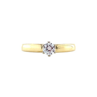 Gold solitaire ring with 14 carat diamond