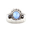 Weißgoldener Entourage-Ring mit Tansanit und Diamant 18 kt