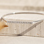 Weißgoldener Armreif mit Diamant 14 Karat