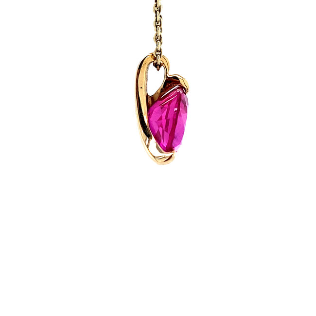 14 karat gold pendant with pink gemstone