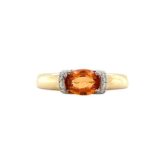 Gouden ring met spessartiet en diamant 14 krt