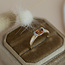 Gouden ring met Spessartiet en diamant 14 krt