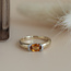 Gouden ring met Spessartiet en diamant 14 krt