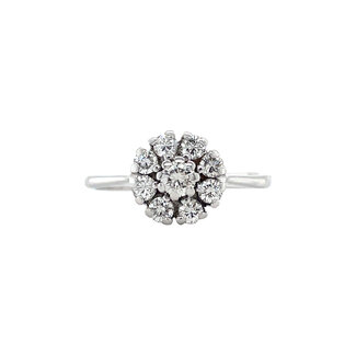 White gold entourage ring with diamond