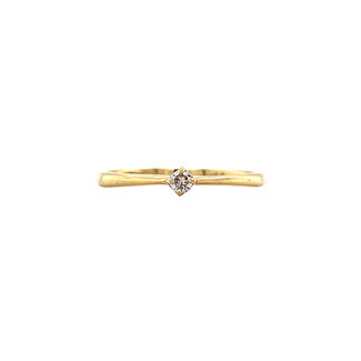 Gold solitaire ring with diamond