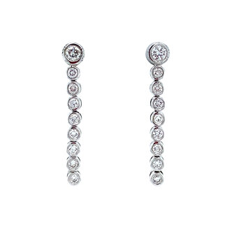 Witgouden oorstekers met diamant