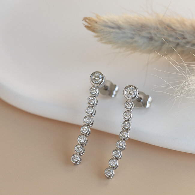 Witgouden oorstekers met diamant 14 krt