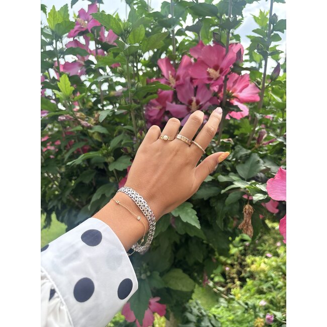 Gold row ring with diamond 18 karat