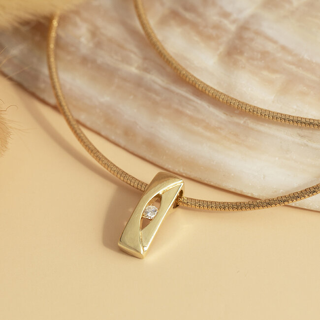 Gold torque with diamond pendant 14 carat