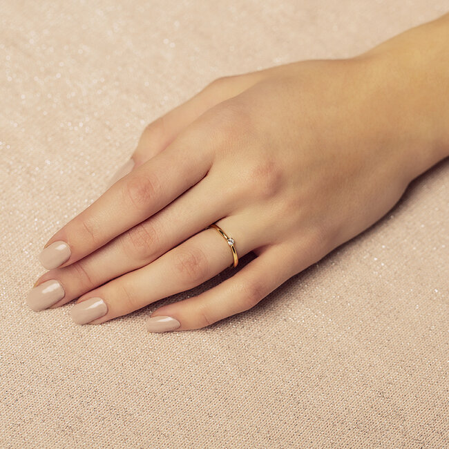 Gouden solitair ring met diamant 14 krt