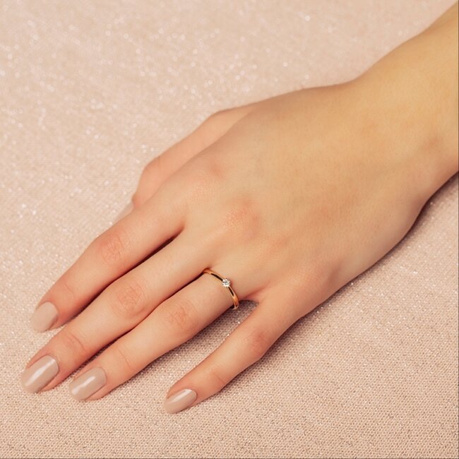 Gouden solitair ring met diamant 14 krt