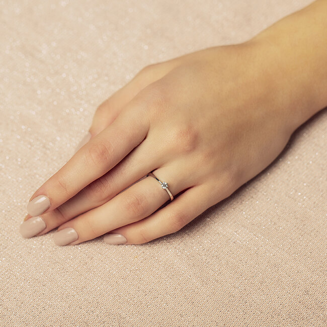 Witgouden solitair ring met diamant 14 krt