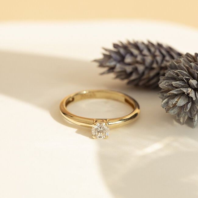 Golden solitaire ring from Blush 14 karat