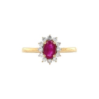 Gouden entourage ring met robijn en diamant 14 krt