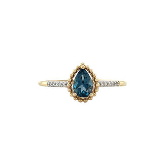 Gouden fantasie ring met topaas en diamant 14 krt