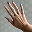 Geelgouden fantasie ring met topaas en diamant 14 krt