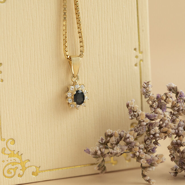 Gold entourage pendant with zirconia 14 karat