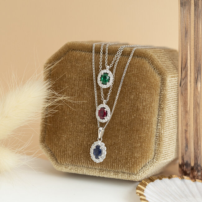 Weißgoldenes Entourage-Collier mit Saphir und Diamant 14 kt