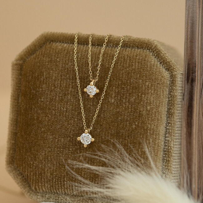 Geelgouden solitair collier met diamant 14 krt