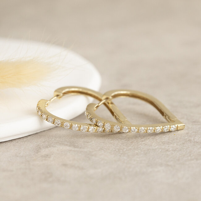 Gouden hart oorringen met zirkonia 14 karaat