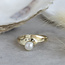 Gouden ring met parel en diamant 14 karaat