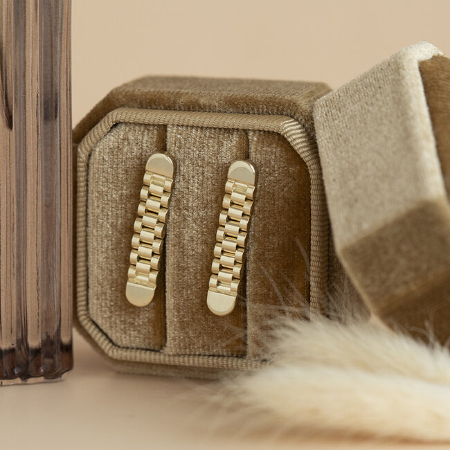 Gold Rolex stud earrings 14 karat