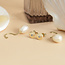 Goldene Ohrstecker mit Diamant und Perle 14 Karat