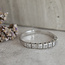 Witgouden rijring met diamant 14 karaat