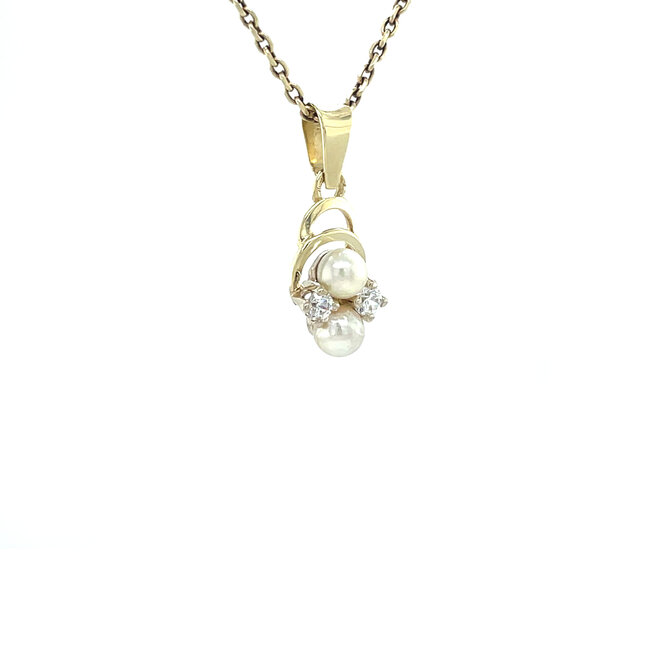 Gold pendant with pearl and zirconia 14 karat