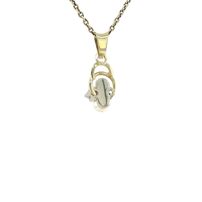 Gold pendant with pearl and zirconia 14 karat