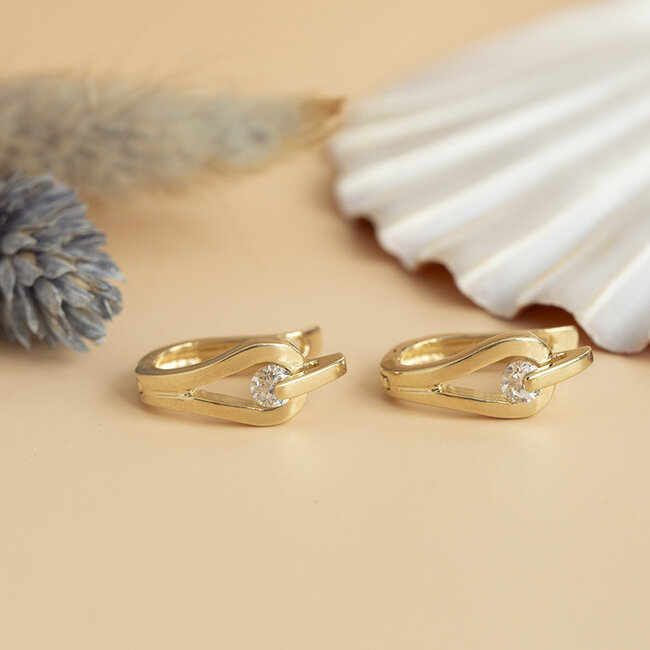 14 karat gold ear jewelry with zirconia