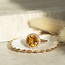 Gold entourage ring with citrine and diamond 18 karat