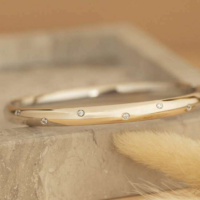 White gold bangle with zirconia 18 karat