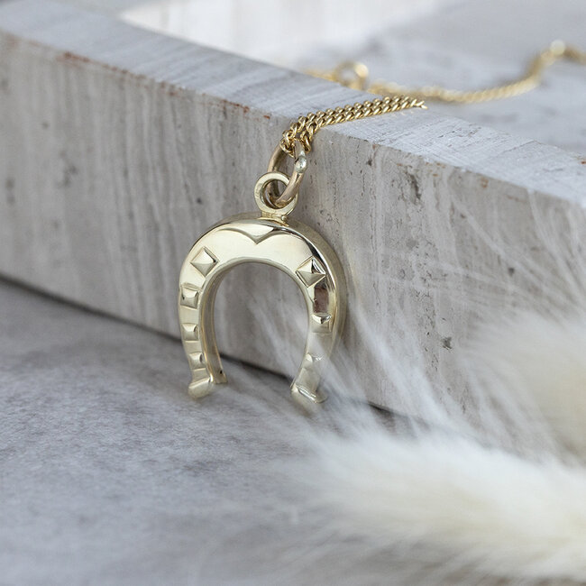 Gold horseshoe pendant 14 karat